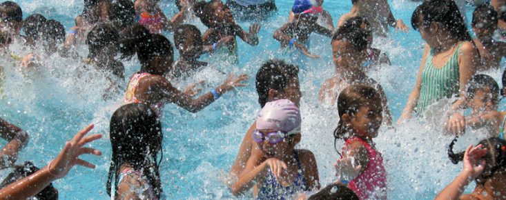 Children playing in a swimming pool