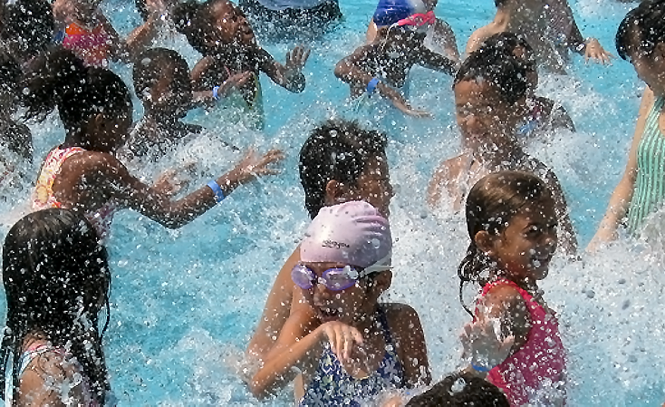 Children playing in swimming pool