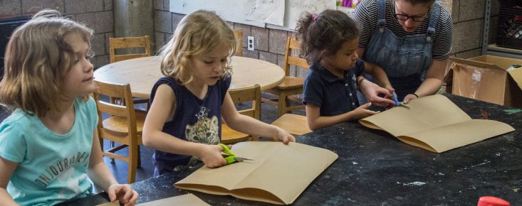 Children take an art class