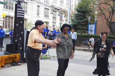 Seniors dance outside at event