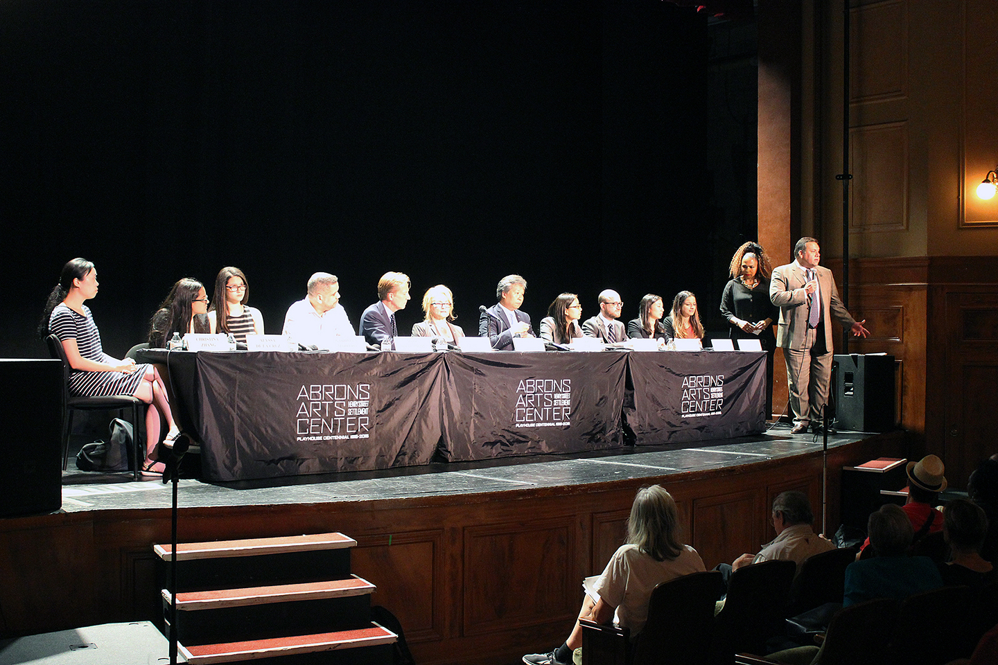 Panel on stage at Abrons Arts Center at Candidates Forum, August, 2016