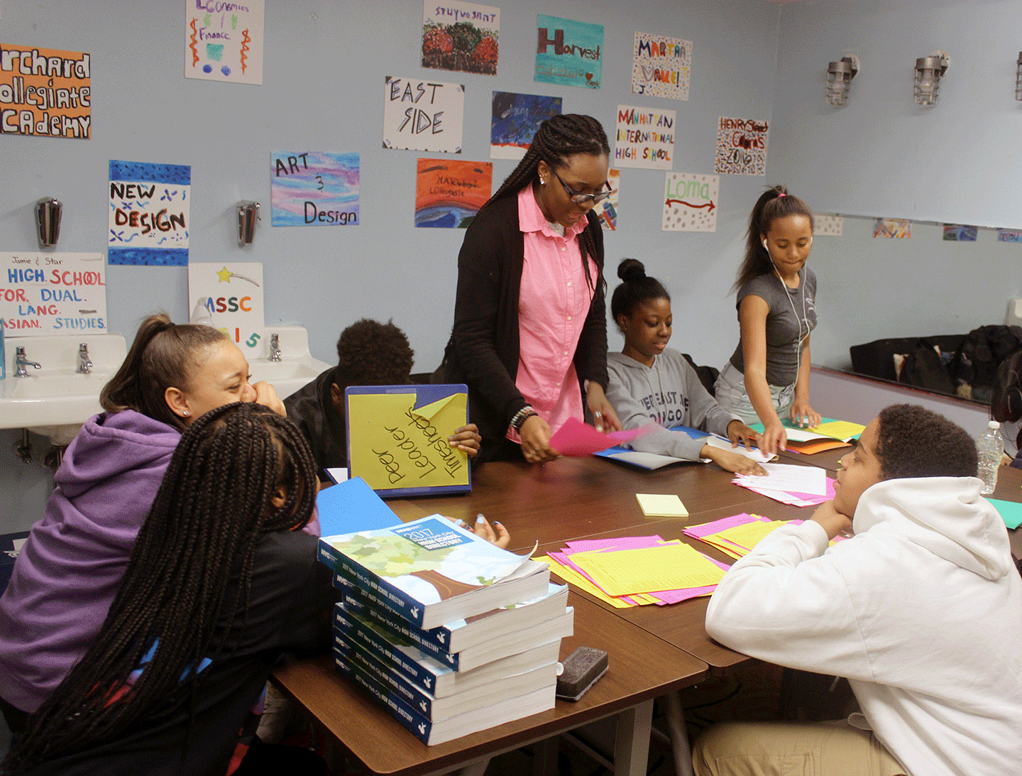 Teacher and middle schoolers in classroom