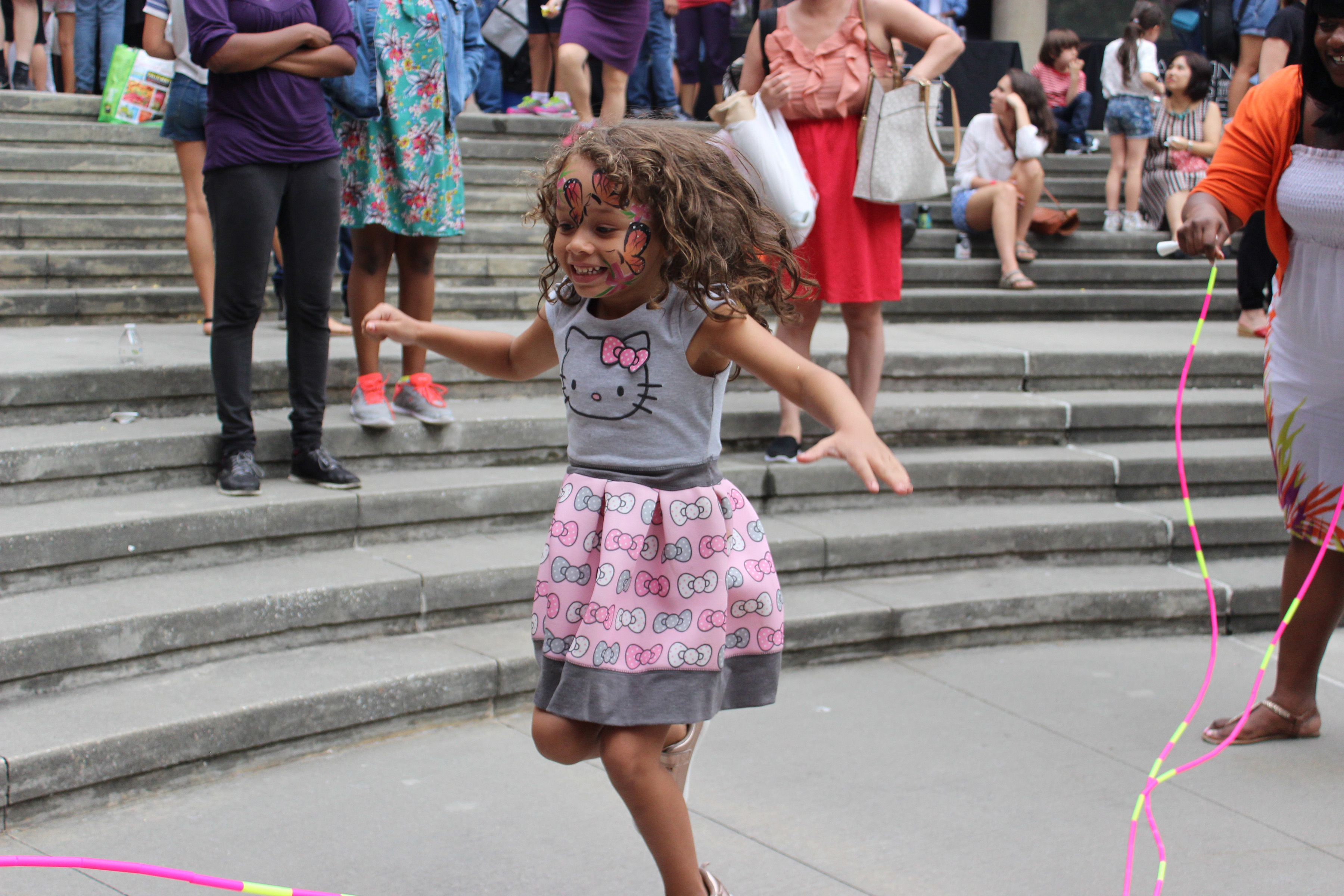 Little girl jump roping and enjoying Community Day at Abrons Arts Center, summer 2017