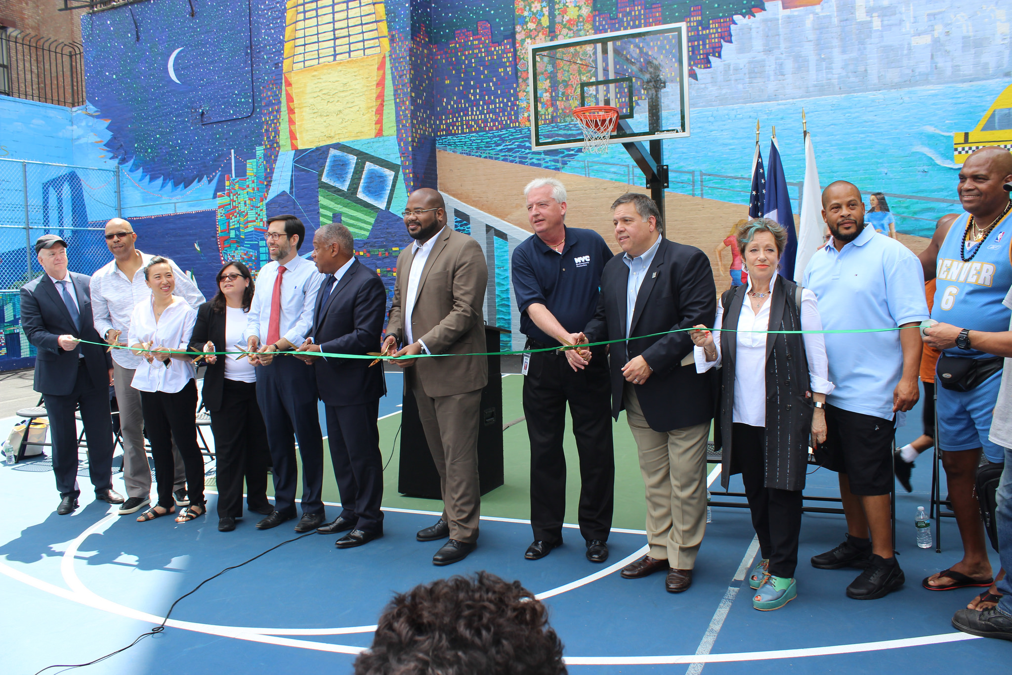 Elected officials and David Garza getting ready to cut ribbon at park opening