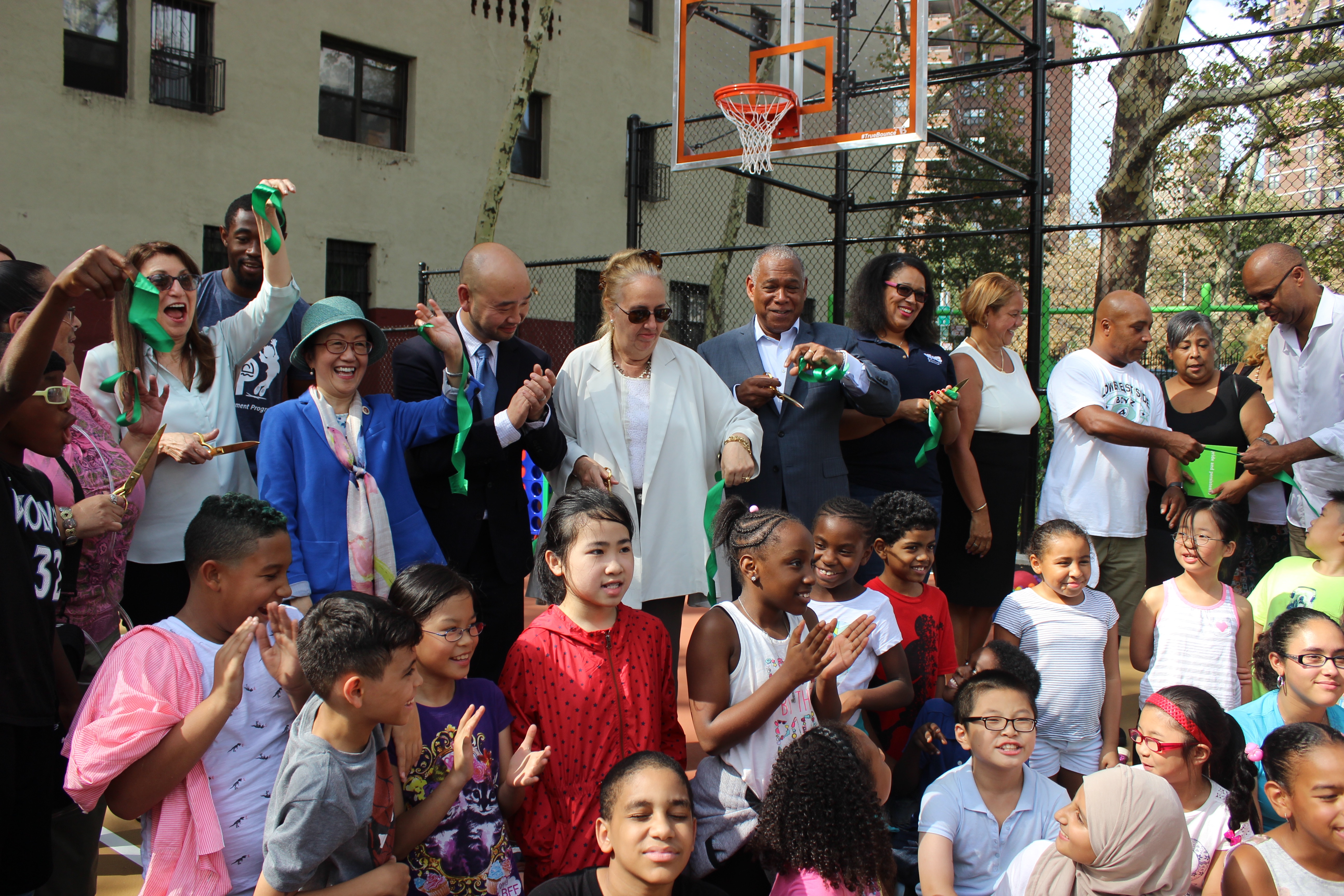Elected officials celebrate ribbon cutting of playground