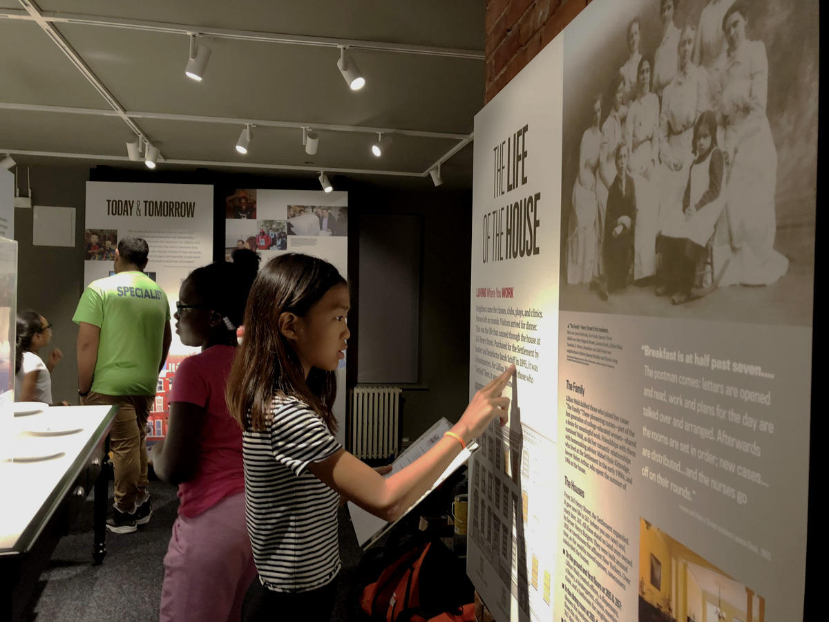 Children at The House on Henry Street exhibit