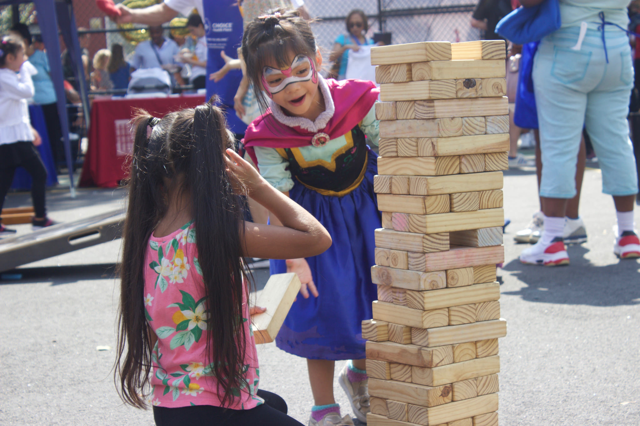 Children play in candid event photo from Henry Street Settlement Community Day event, September 2018