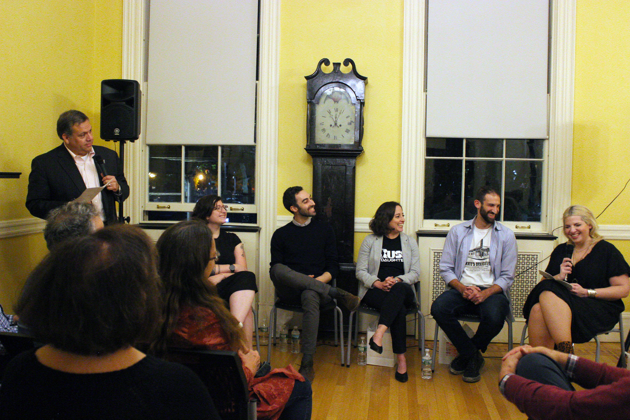 Panel and audience at event