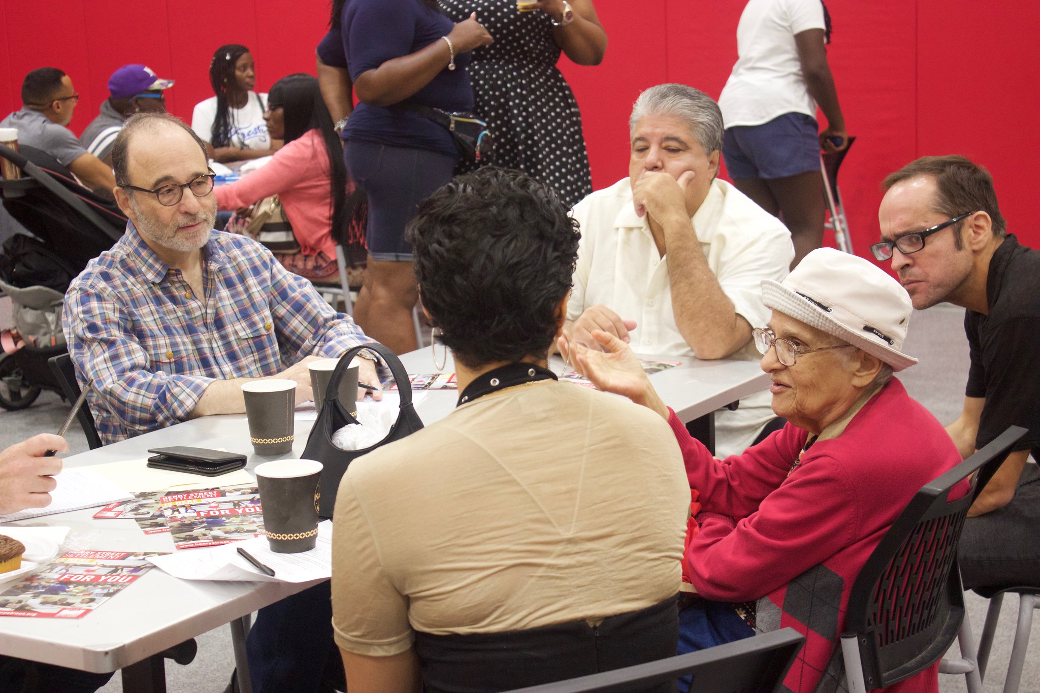 Town Hall attendees sit at table and discuss