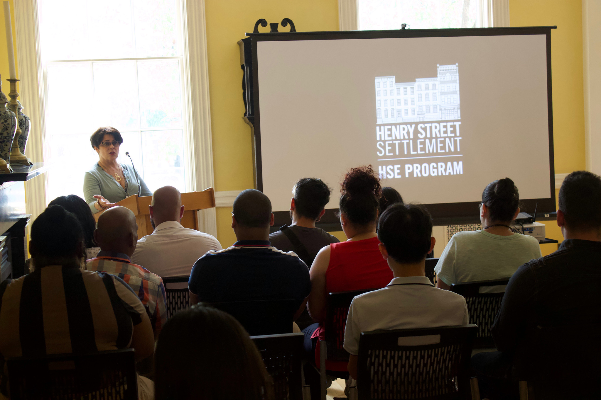 Lisa Diomande addresses the crowd at the HSE program graduation, August 2019