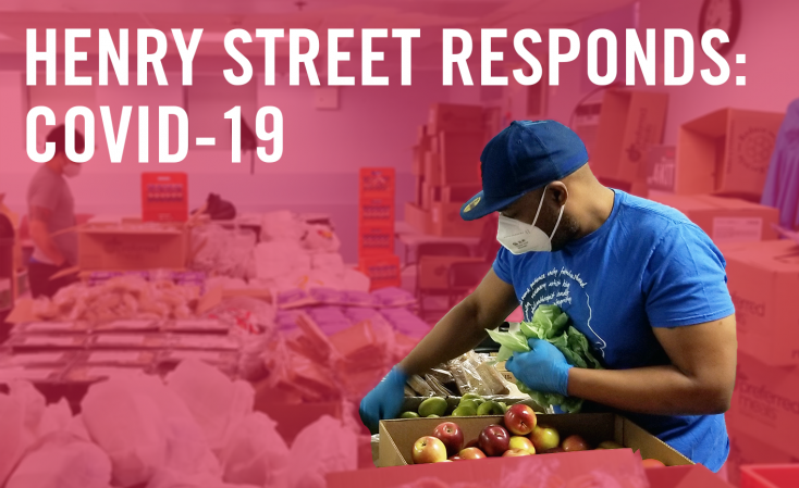 Henry Street team member packs food as part of the agency's COVID response.