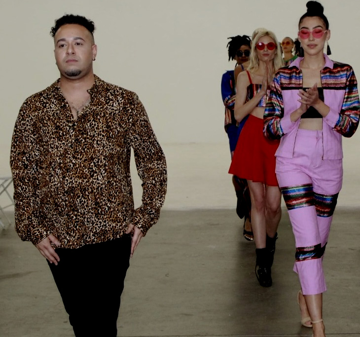 Fashion designer Andres Biel and models walk on catwalk