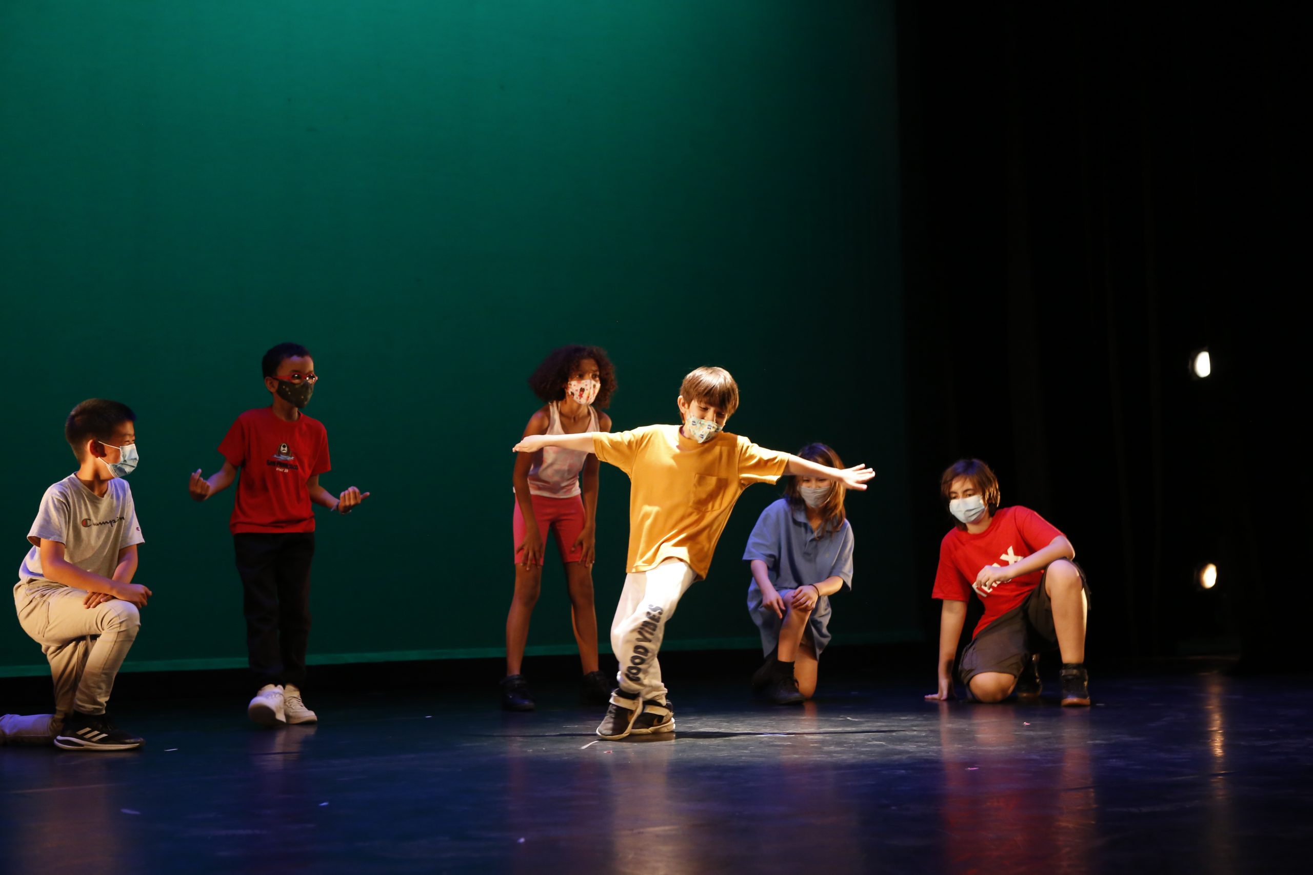 Youth dancing on stage