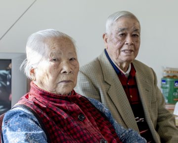 Bai He and Li He Huang in their Lower Manhattan apartment