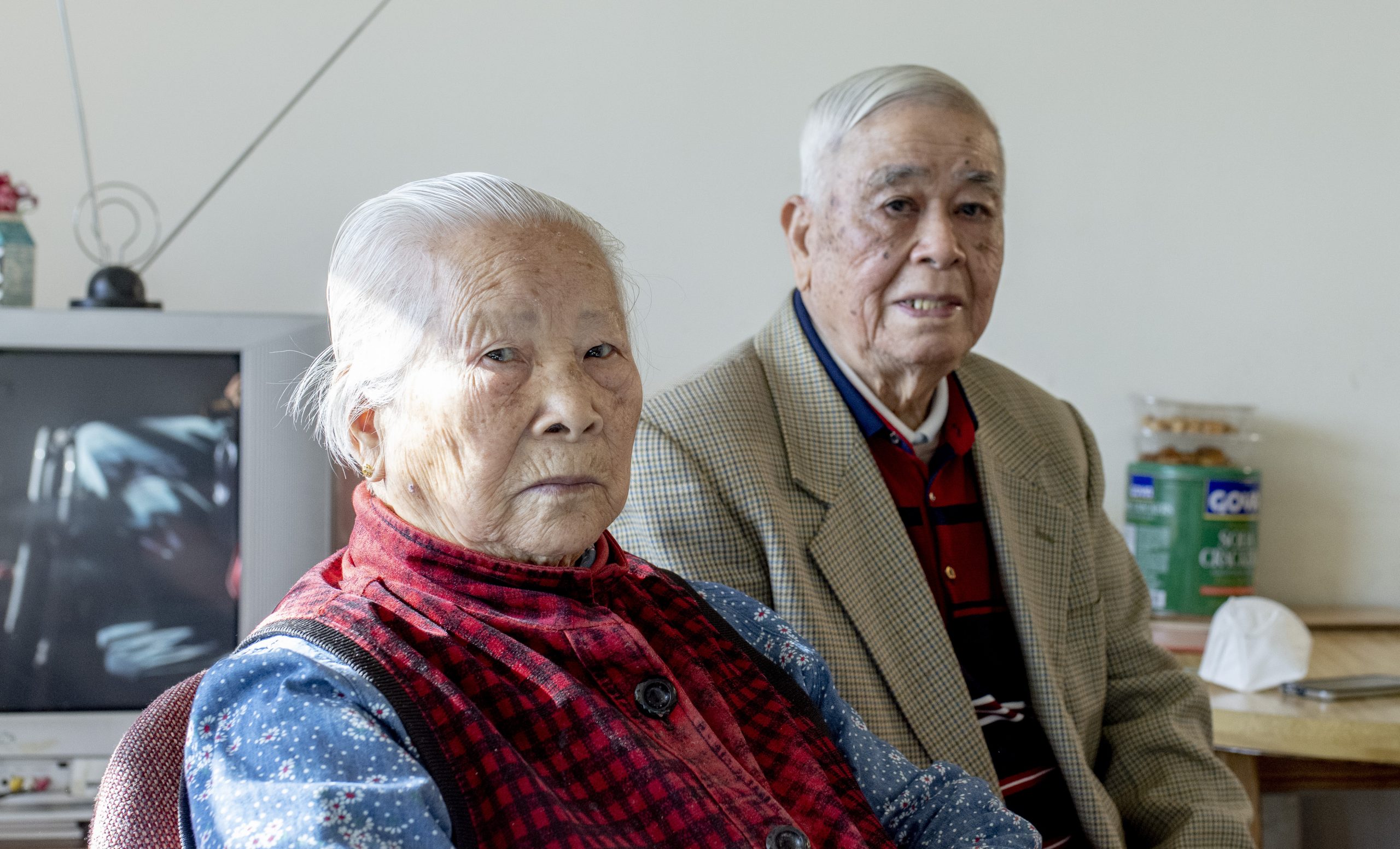 Bai He and Li He Huang in their Lower Manhattan apartment